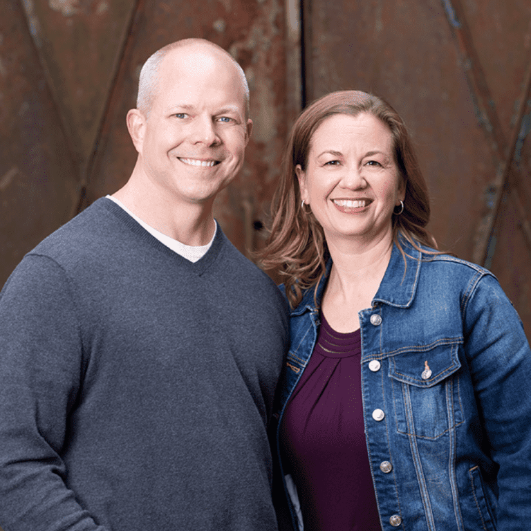 Eric and Kristina Lewis in front of Iron Door